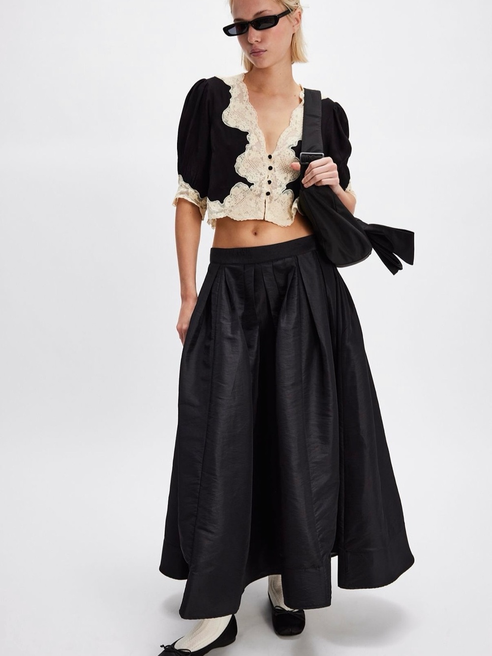 Free People Emilia Black Maxi Voluminous Skirt with subtle sheen finish, size M.